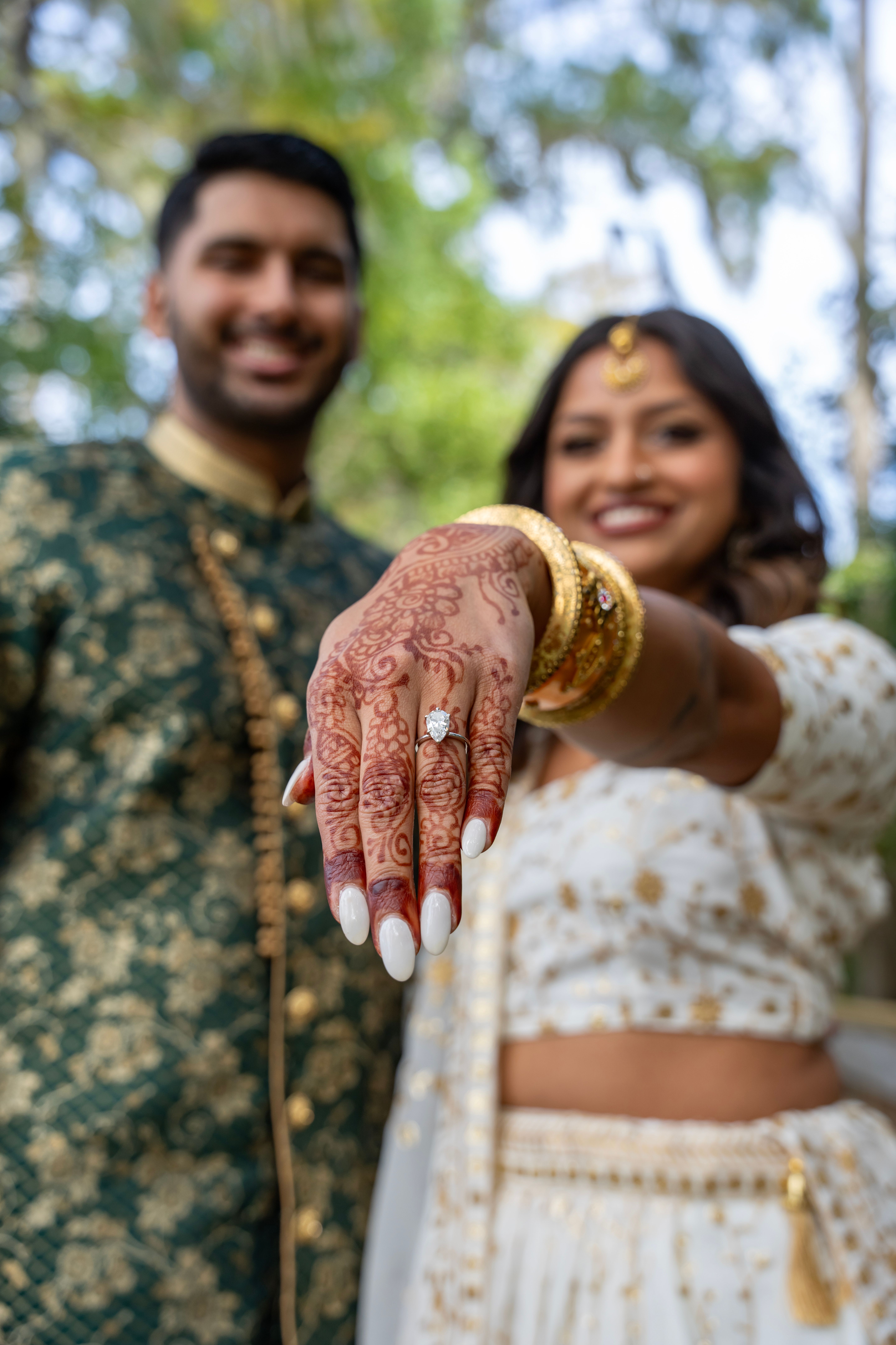 Engaged Couple Showing Engagement Ring with Henna Design · Free Stock Photo