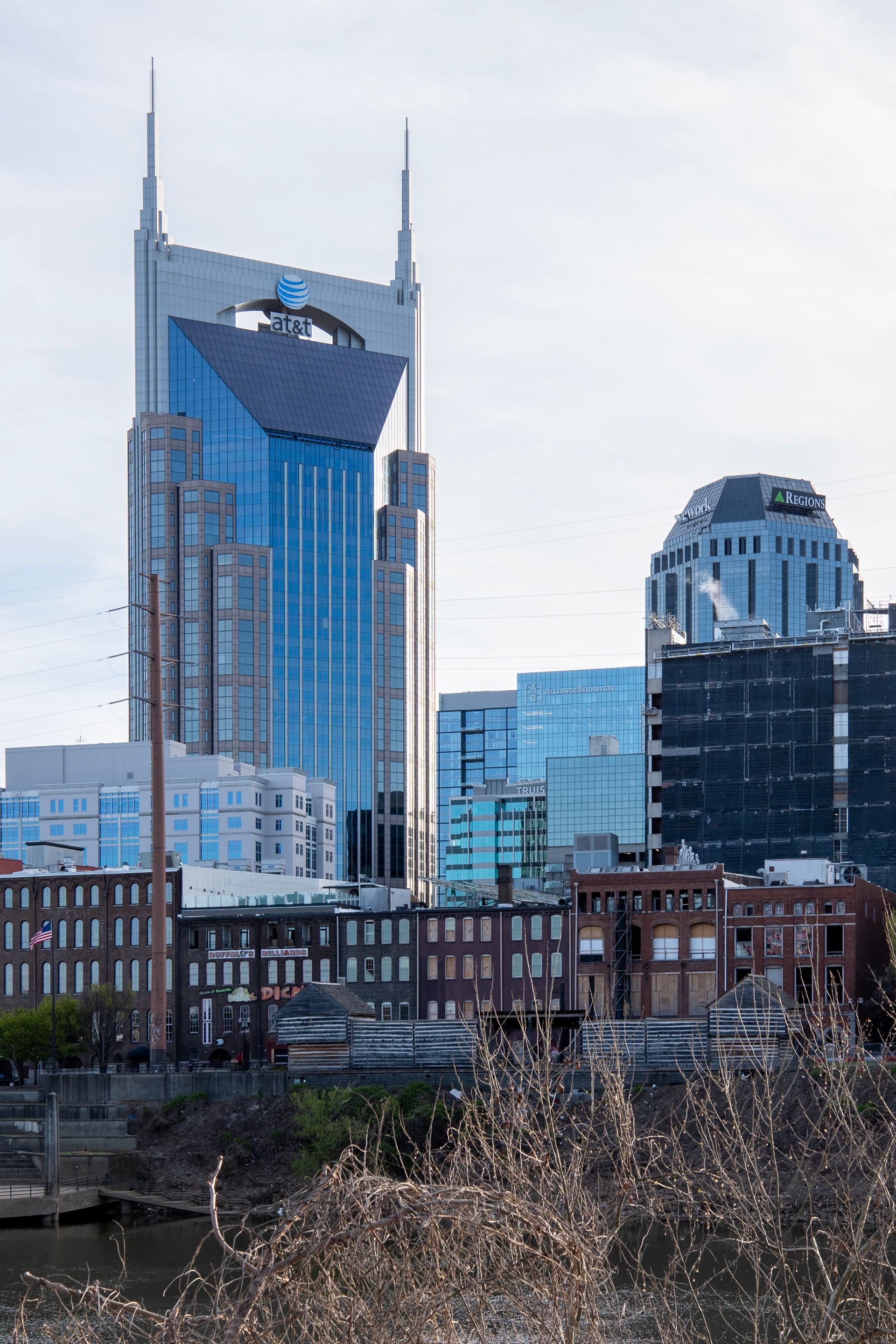 Nashville skyline at dusk with warm city lights, Tennessee