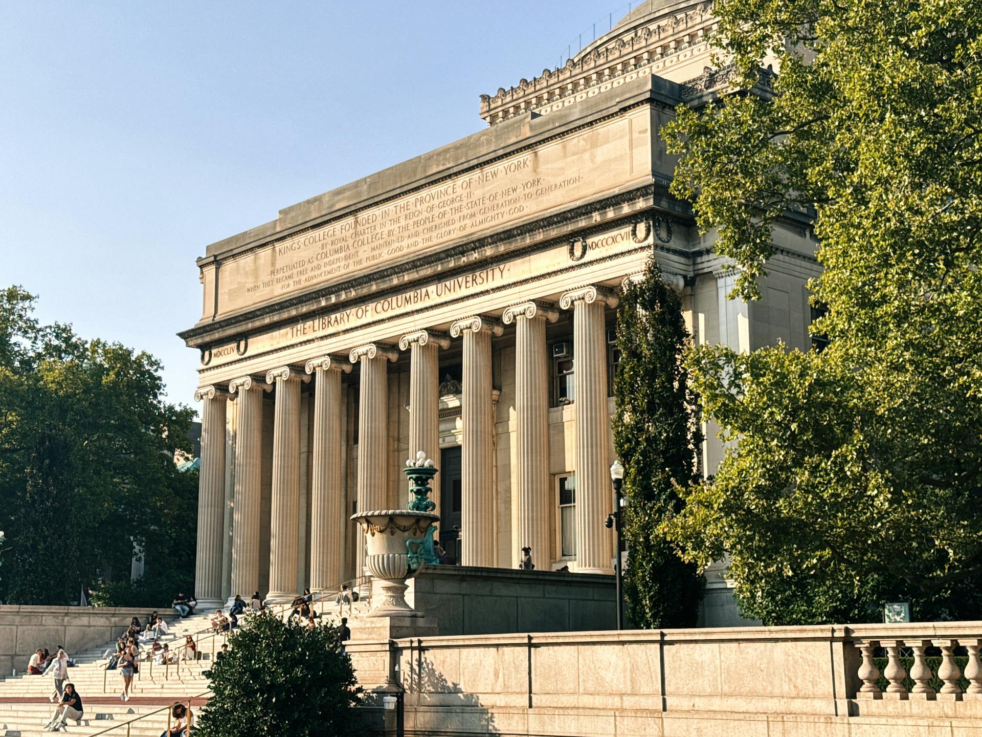 Historic Columbia University Library in a sunny outdoor setting.