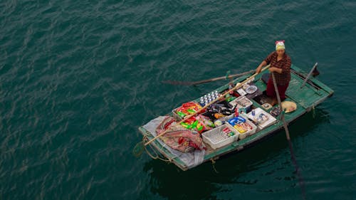 Woman Riding Boat