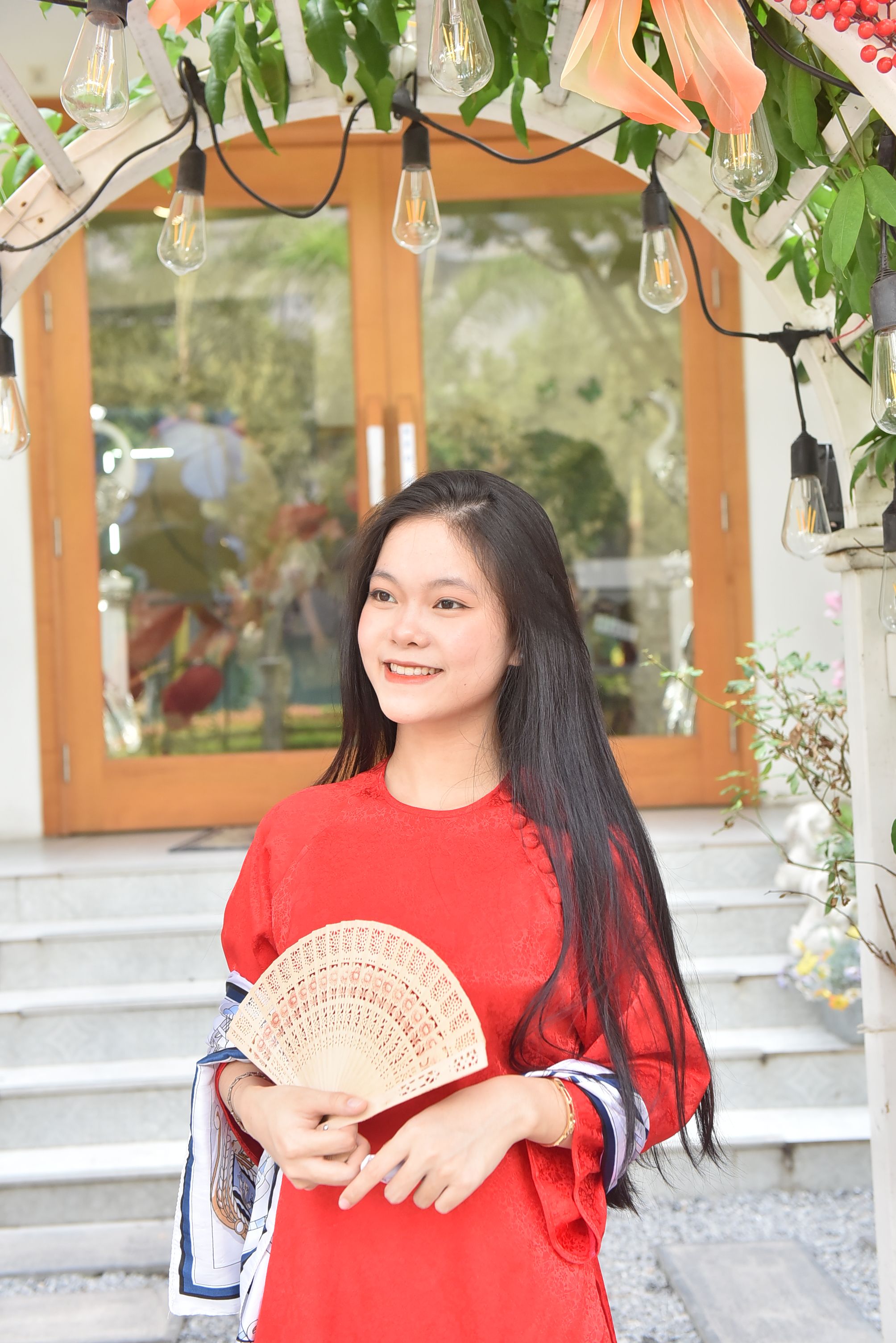 Young Woman in Traditional Red Dress with Fan · Free Stock Photo