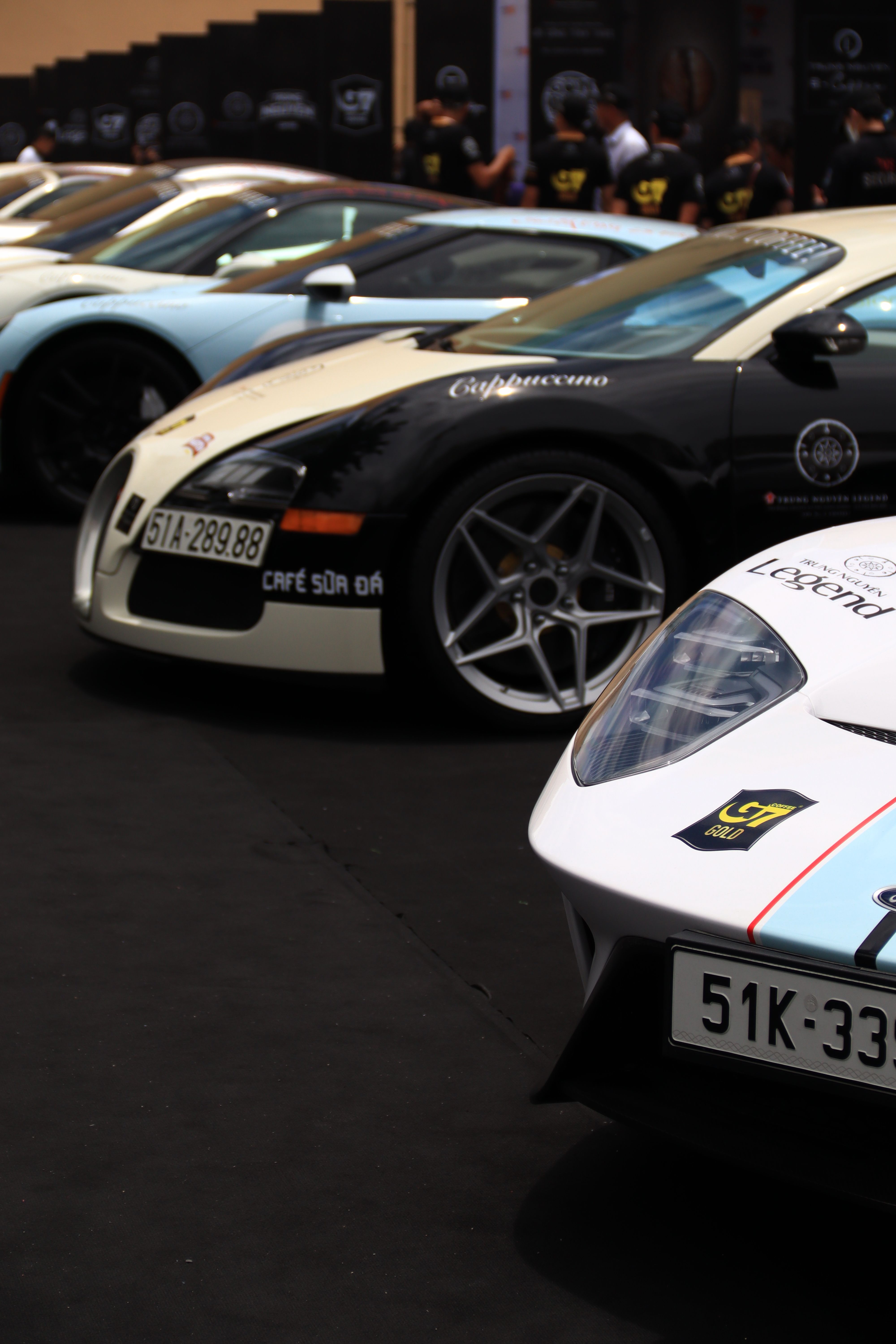Luxurious Sports Cars Lined Up at Auto Show · Free Stock Photo