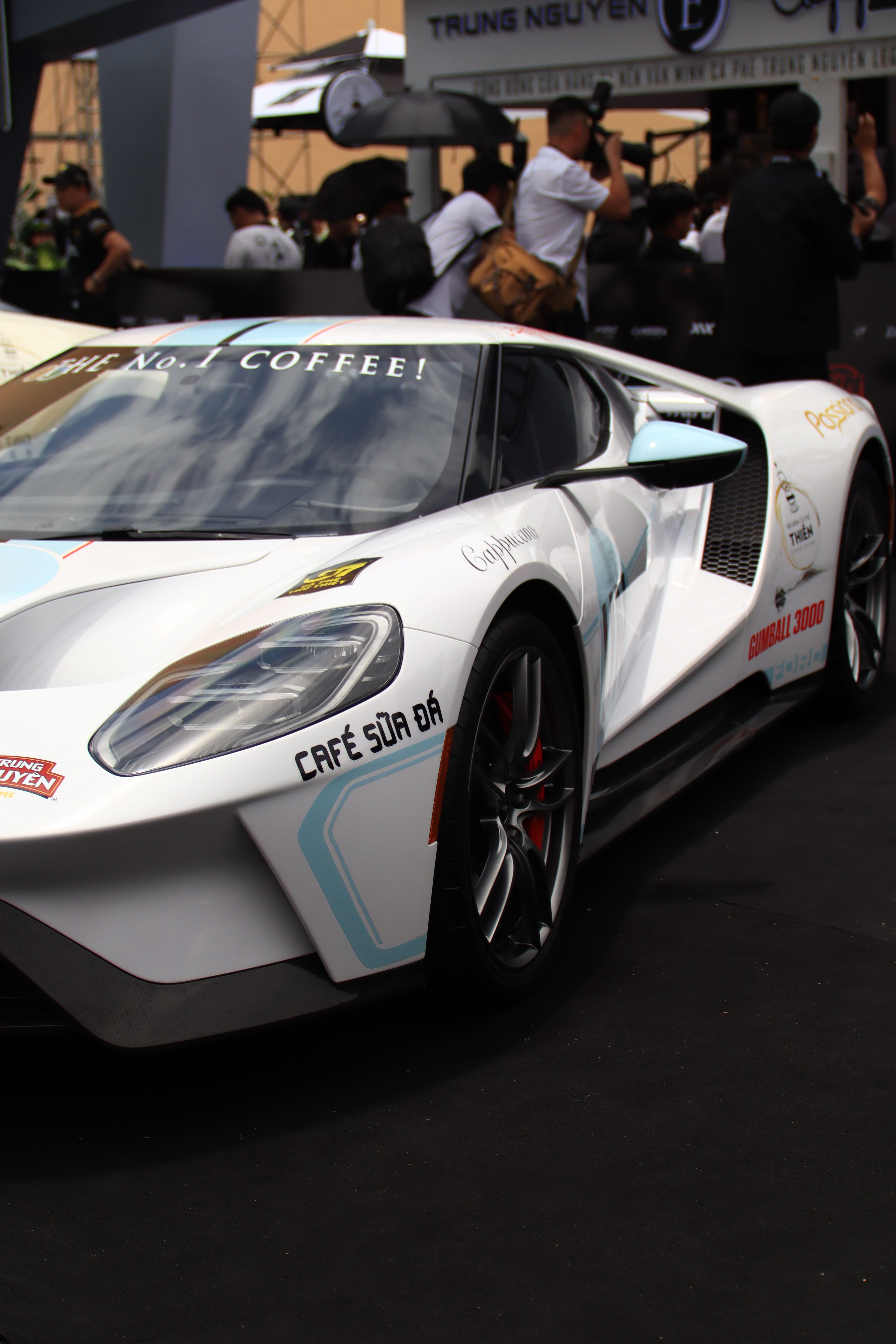 Sleek White Sports Car at an Automotive Event · Free Stock Photo