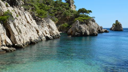 Free Crystal clear waters and rugged cliffs on a sunny day in Marseille. Stock Photo