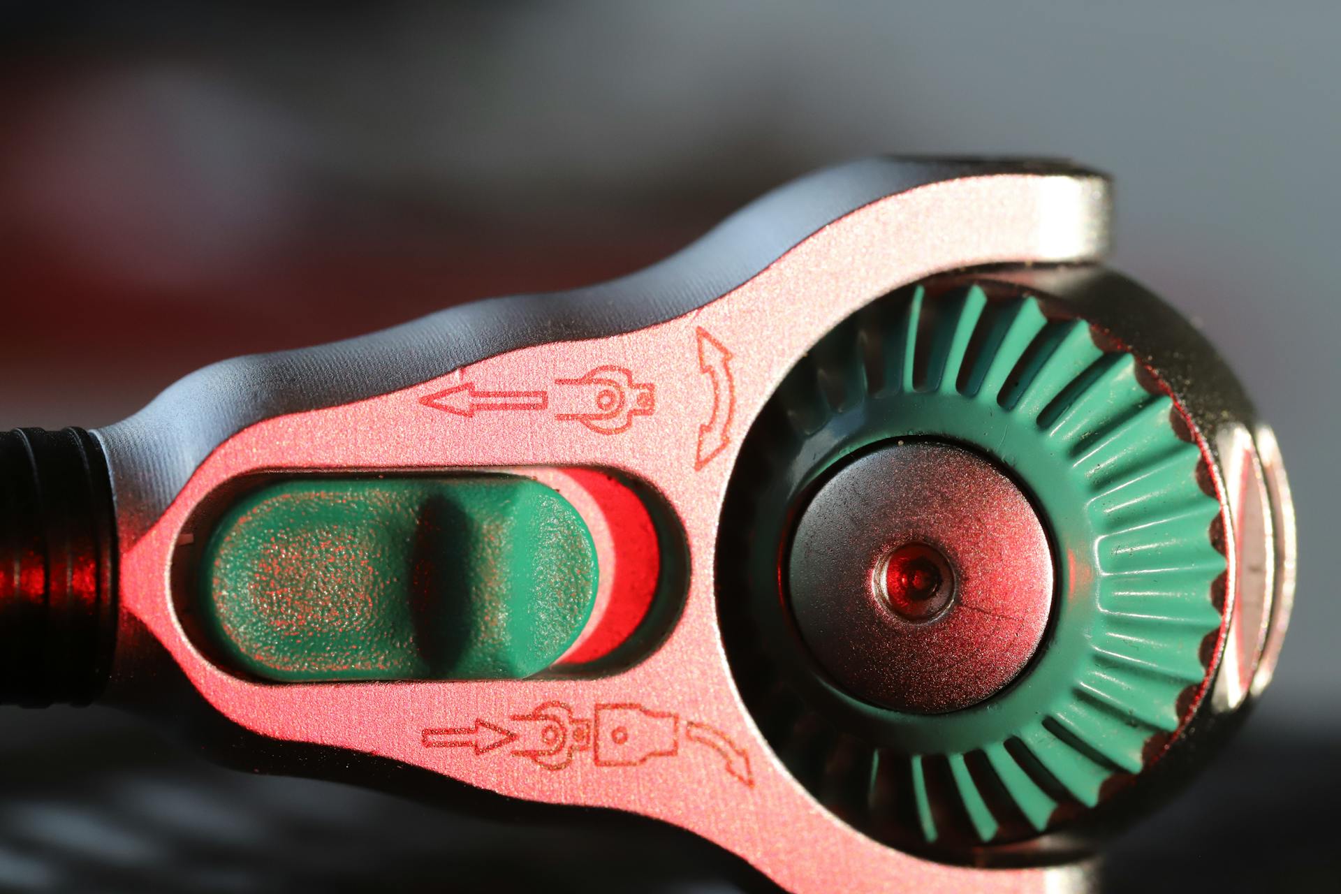 Detailed close-up of a mechanical gauge knob with indicators.