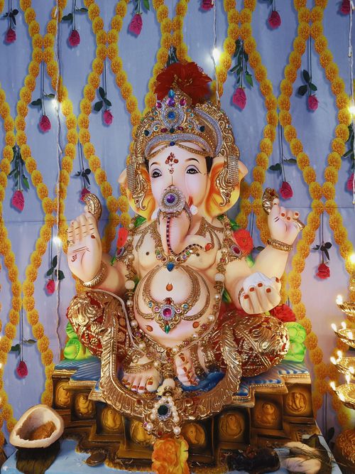 Free Stunning Ganapati idol adorned with jewels and flowers during Ganesh Chaturthi in Mumbai, India. Stock Photo