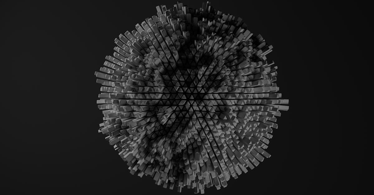 Monochrome 3D geometric shape with textured cubes on a dark background.