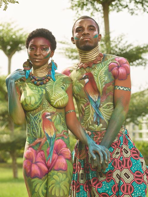 Vibrant Body Art Fashion in Lush Greenery · Free Stock Photo