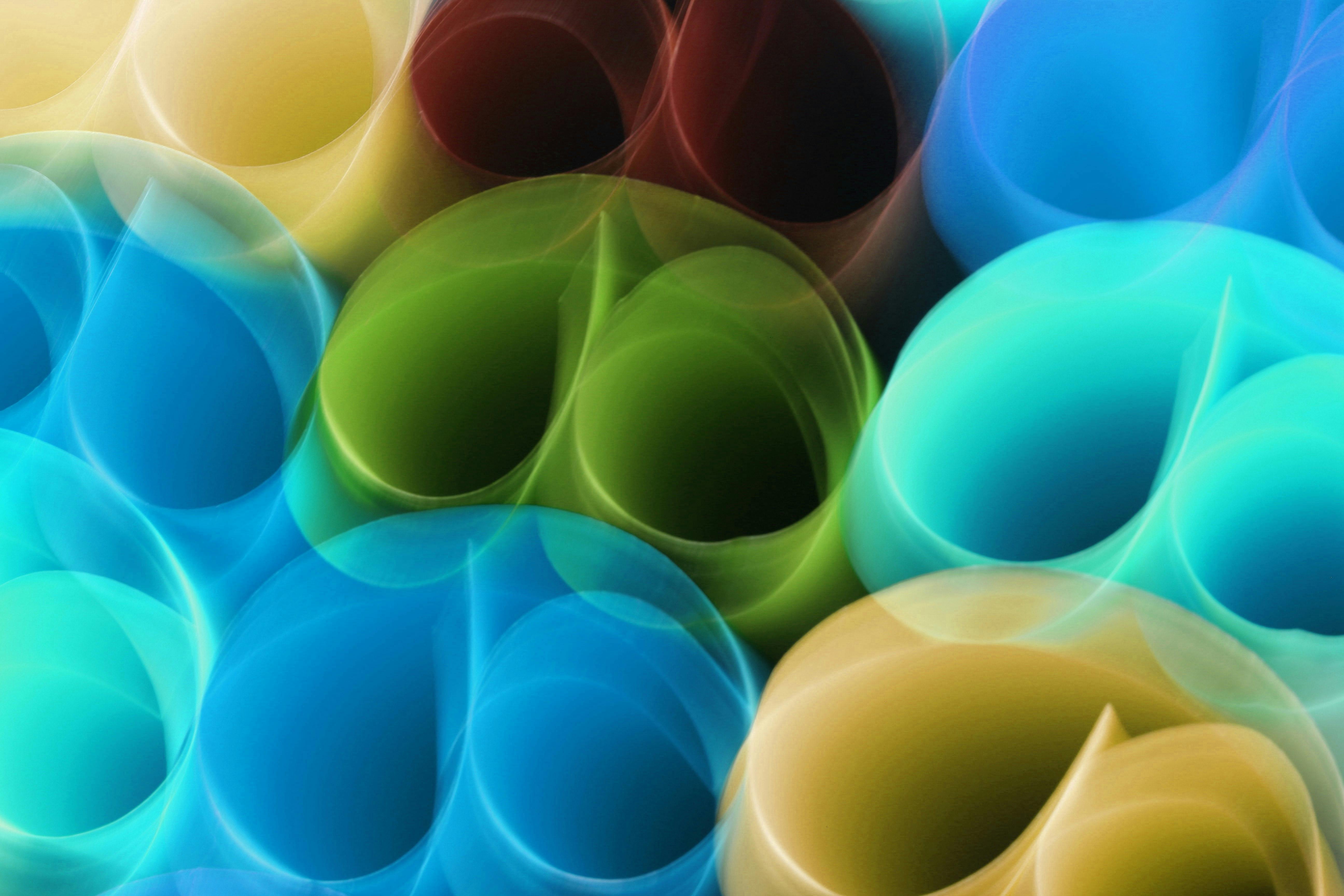 colorful abstract image of rolled paper tubes