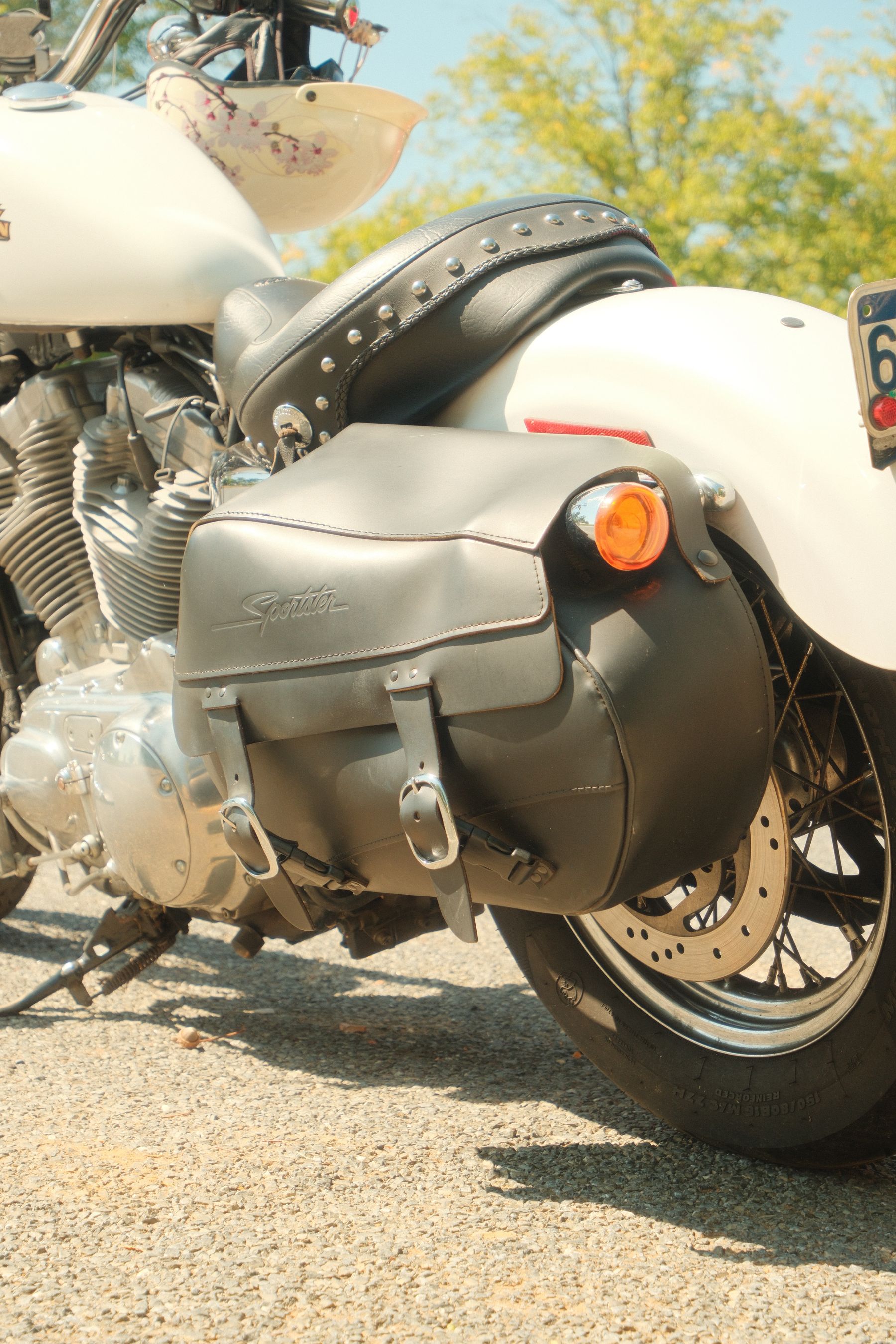 Classic motorcycle with a leather saddlebag