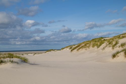 Free Tranquil sand dunes on Amrum Island under a clear sky. Stock Photo