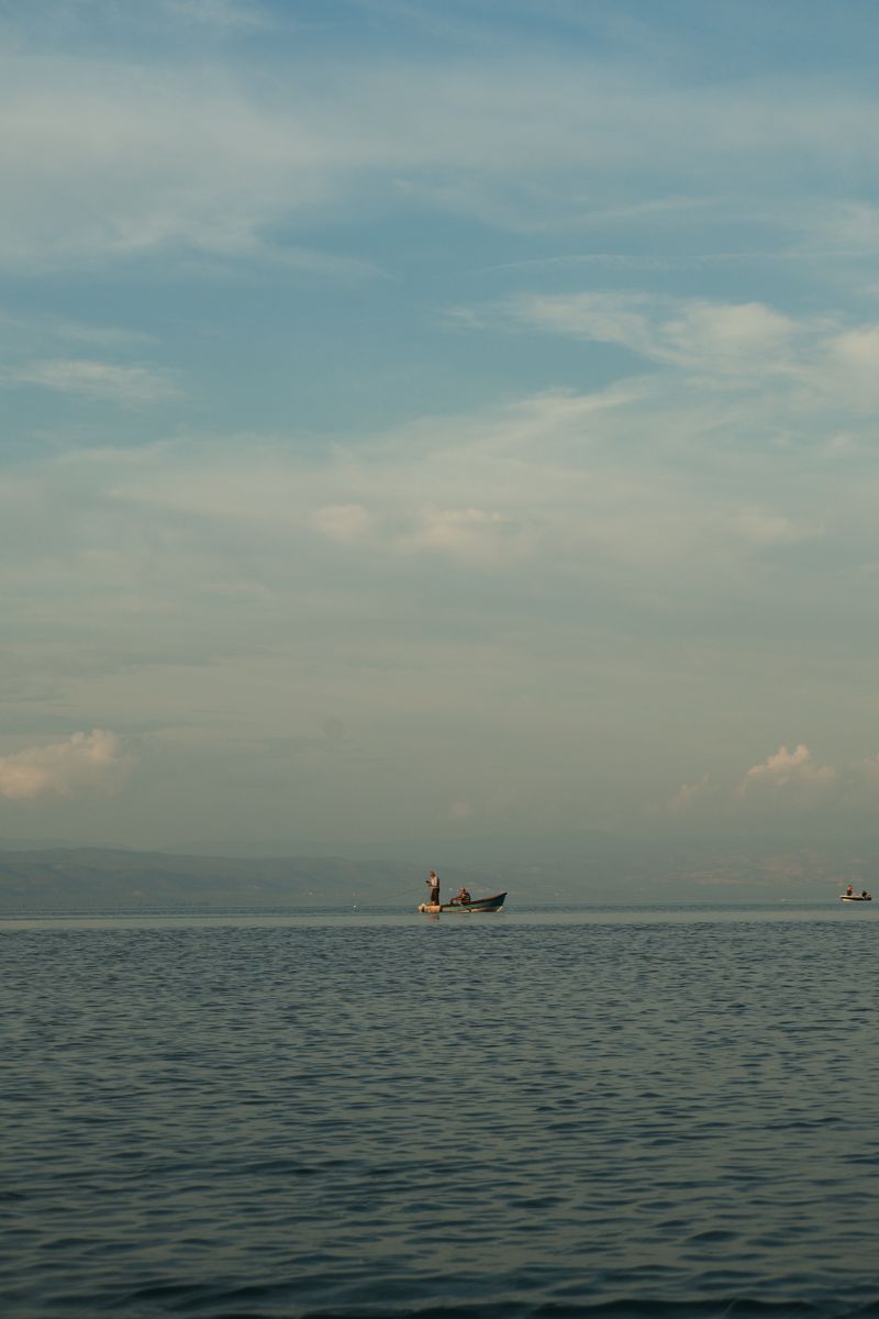 Tranquil clear-water lake at dawn — the kind of water where line visibility matters most