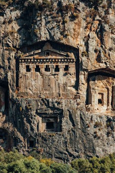 Explore the ancient rock tombs carved into cliffs in Dalyan, Türkiye.