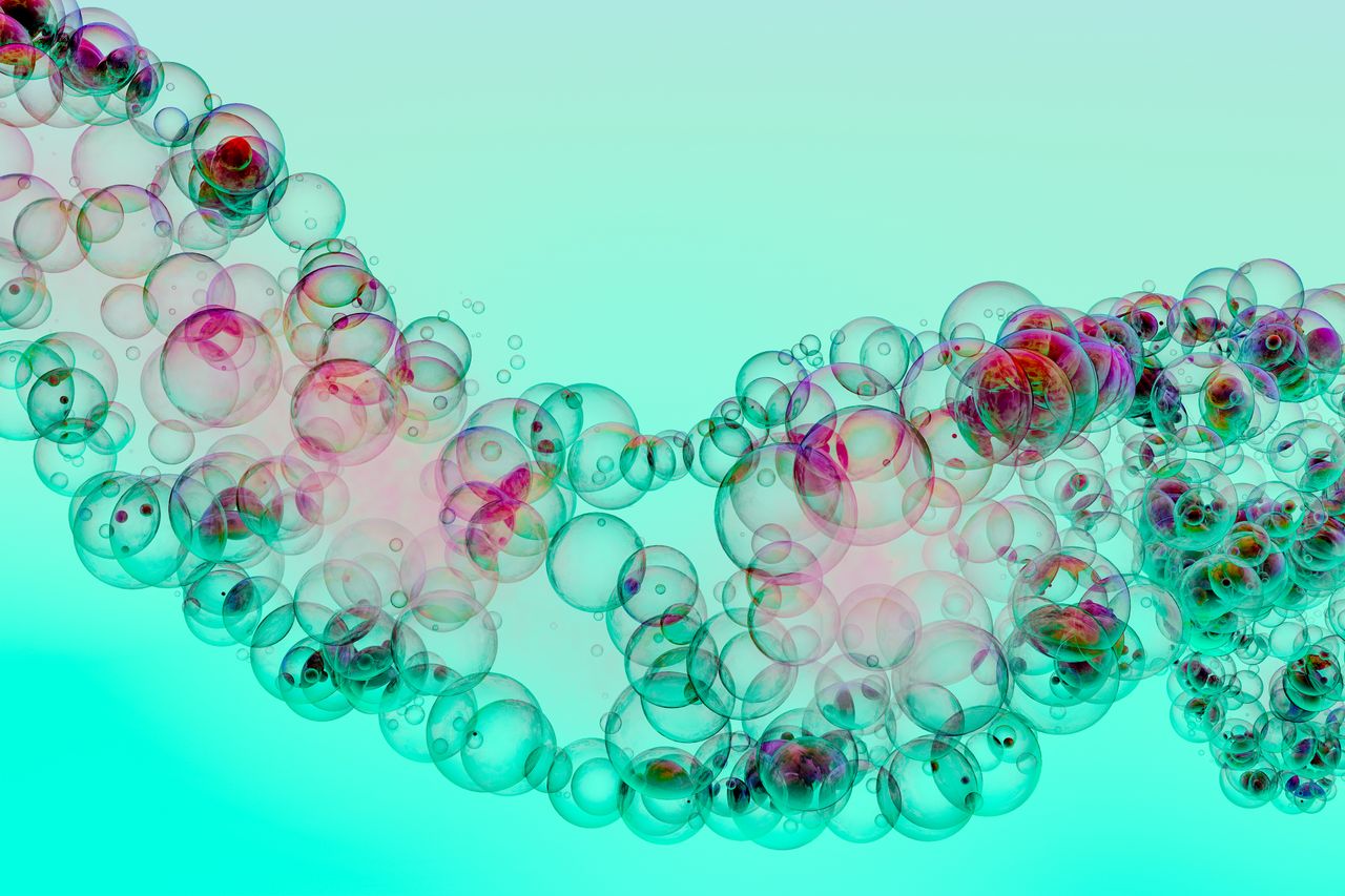 a vivid array of transparent bubbles with an abstract gradient creatin