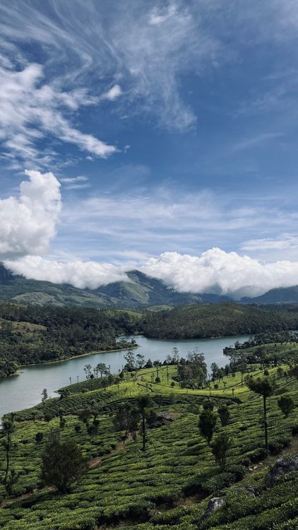Scenic Mountain Lake Landscape with Cloudy Sky · Free Stock Photo
