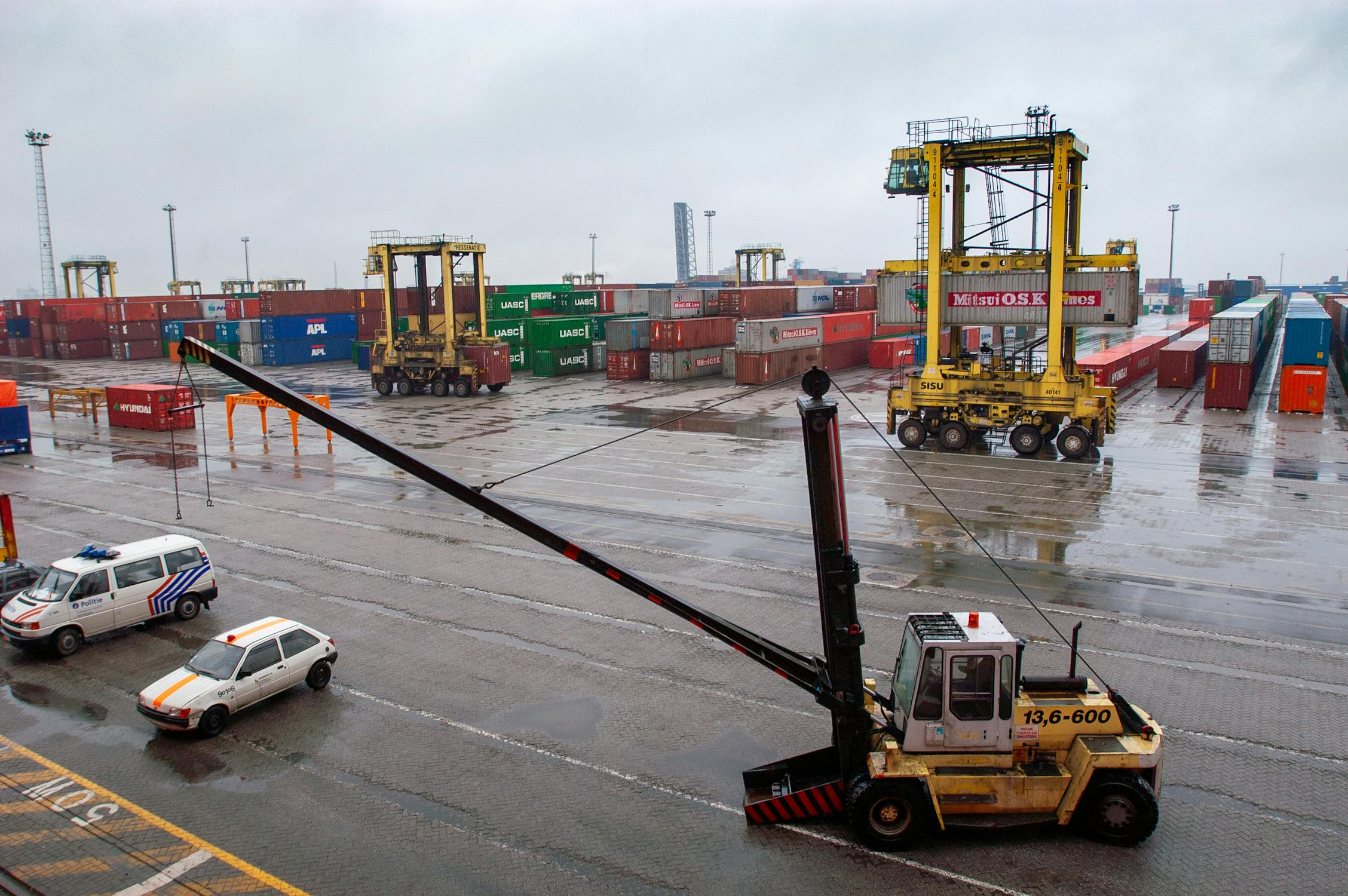 Container Terminal Activity: Straddle Carriers and Reach Stacker in ...