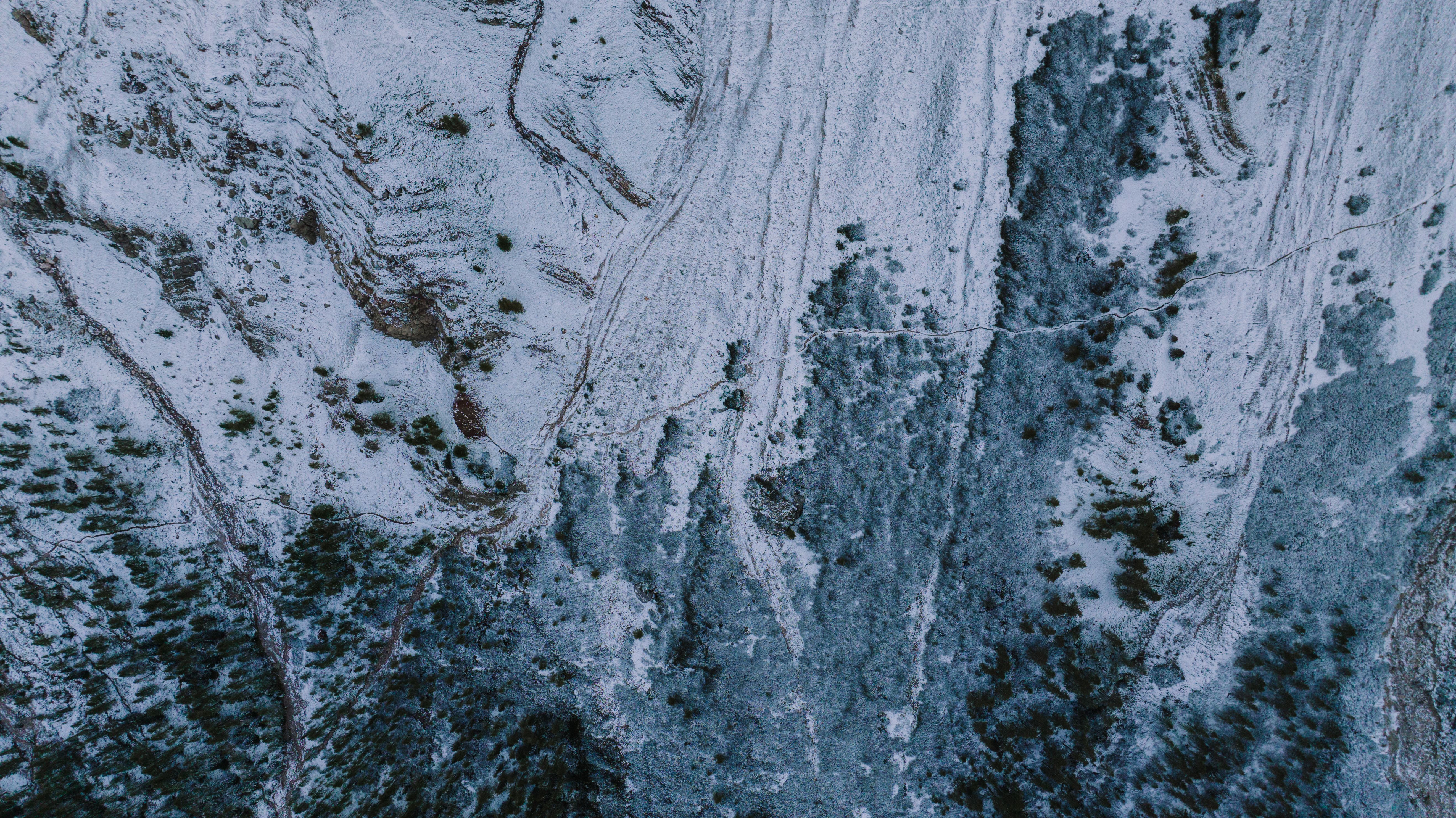Aerial View of Snow-Covered Terrain in Italy · Free Stock Photo