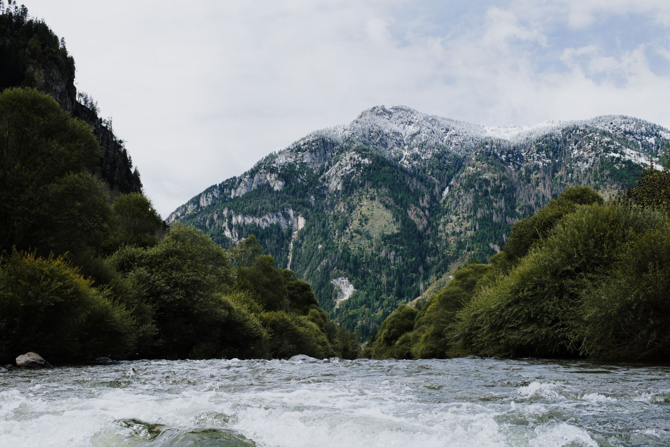 Majestic Mountain Landscape with Flowing River · Free Stock Photo
