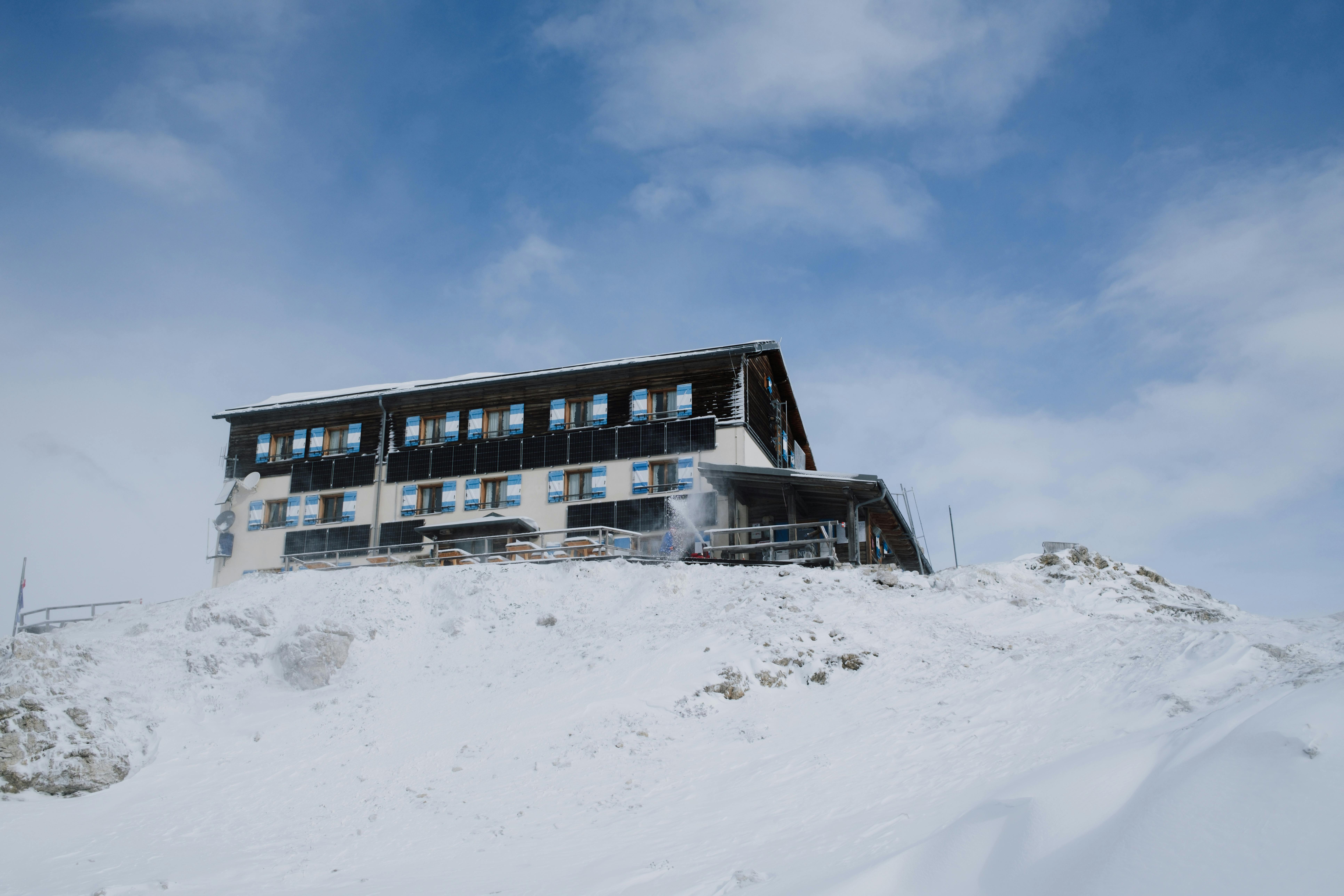 Prescription Goggle Inserts - Charming lodge nestled in the snowy peaks of San Martino di Castrozza, Italy.