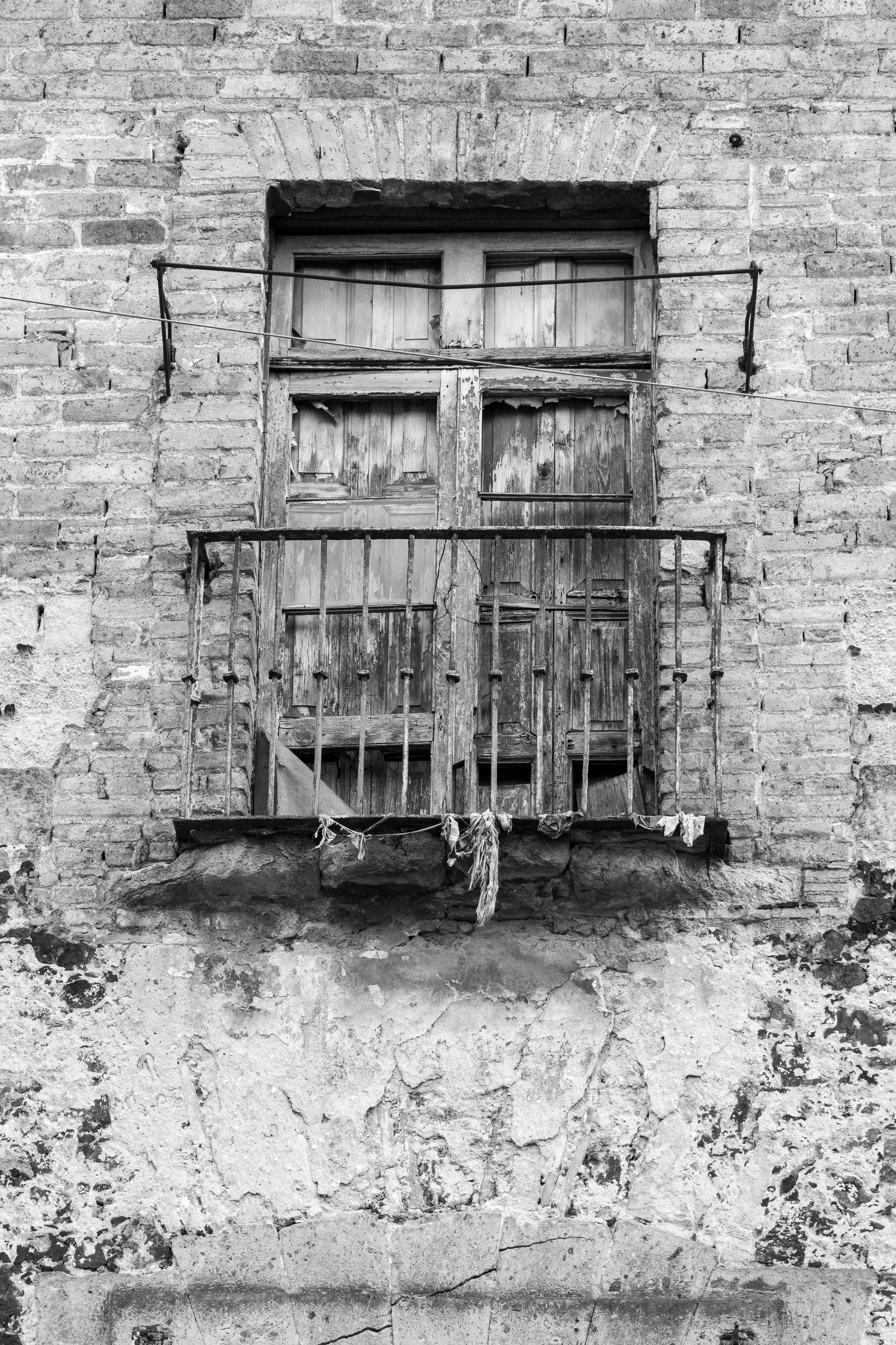 Rustic Old Window with Weathered Balcony in Mexico City · Free Stock Photo