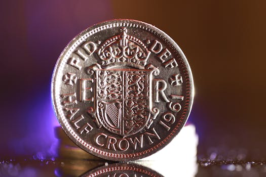 Detailed image of a 1961 British half crown coin reflecting vivid light.