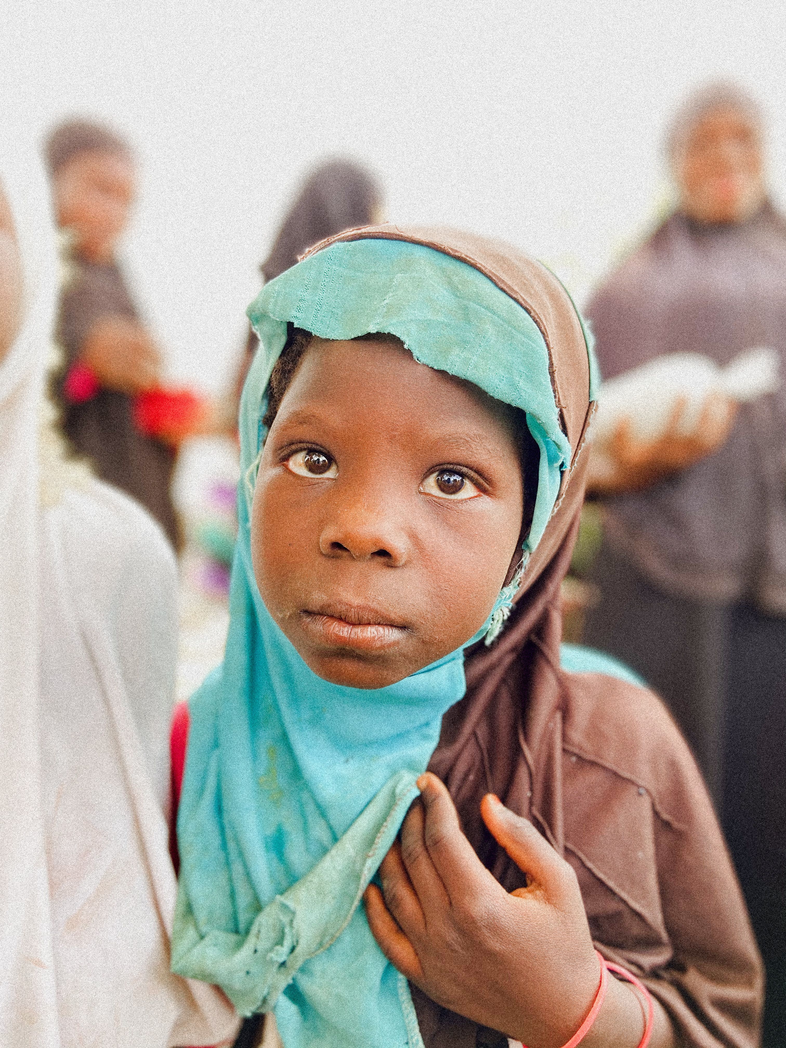 Portrait of a Young Girl in Vibrant Hijab · Free Stock Photo