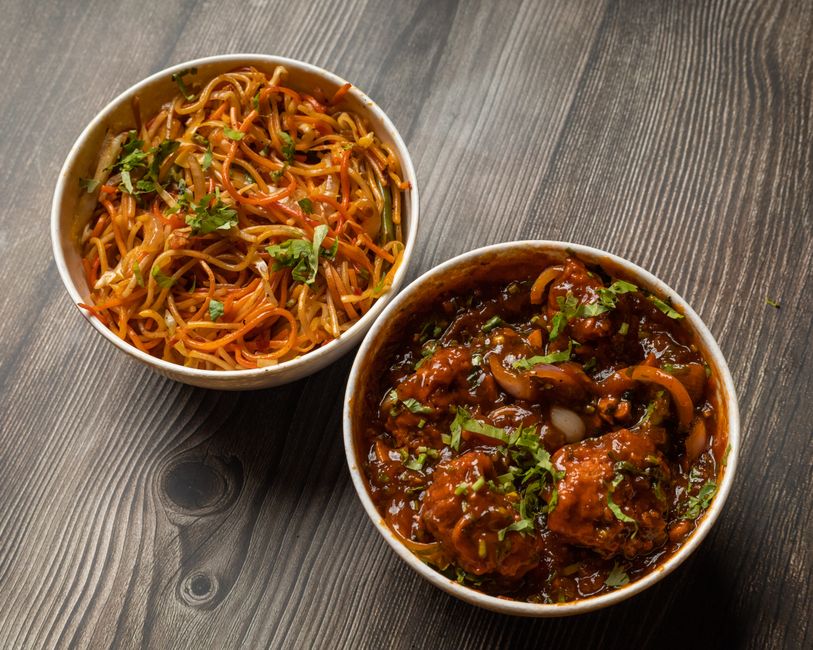Savor the spicy Indian-style noodle and Manchurian combo, a perfect meal for flavor lovers.