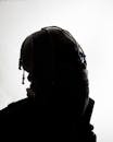 Silhouette of Person Wearing Beaded Crochet Hat