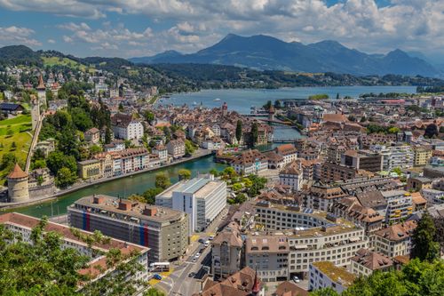 Free Stunning aerial view of Lucerne, showcasing its unique architecture along the lake and mountains. Stock Photo
