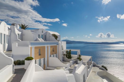 Breathtaking view of Santorini's iconic white architecture overlooking the sparkling Aegean Sea.