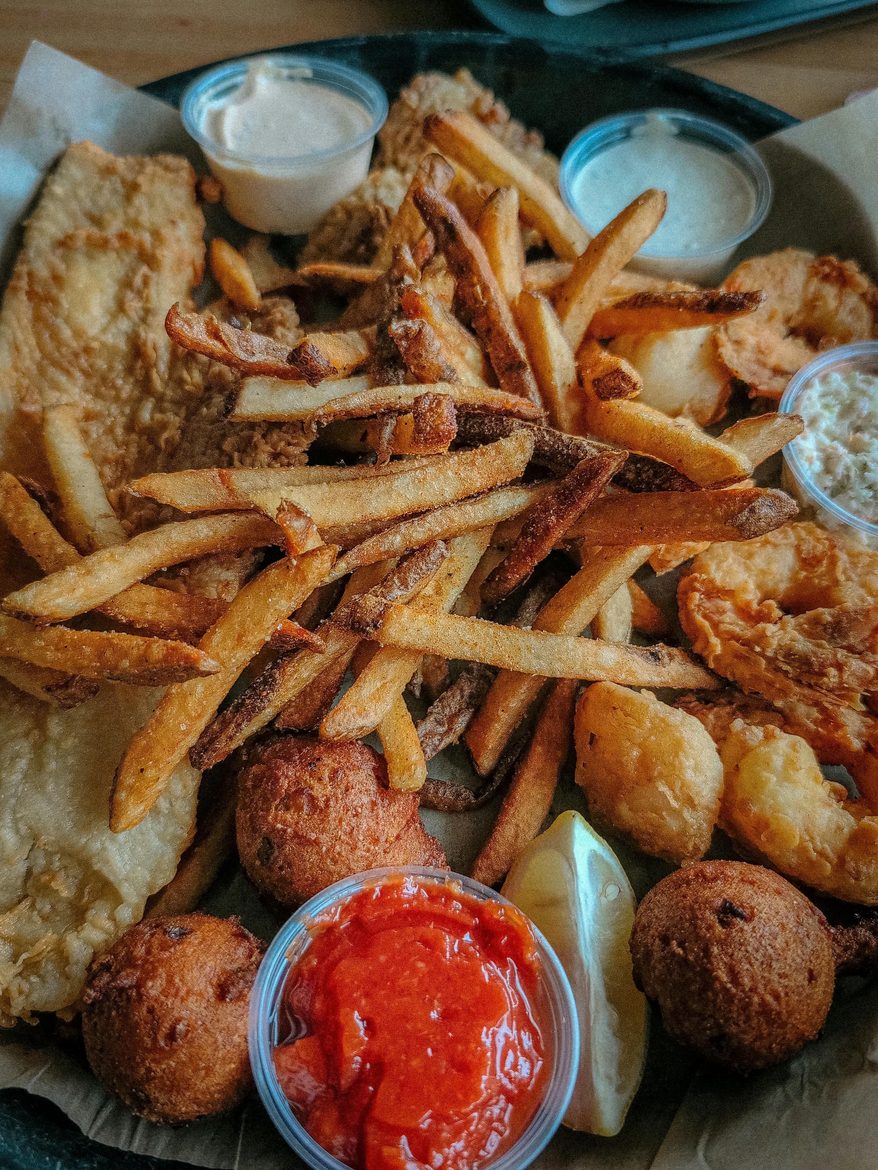 delicious southern fried seafood platter with sauces