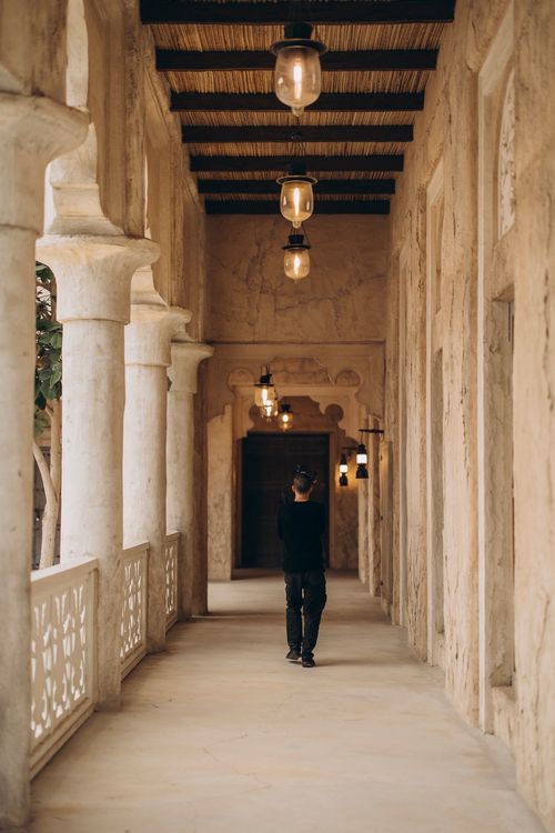 Free Stunning view of classic Dubai architecture with warm lighting during sunset. Stock Photo