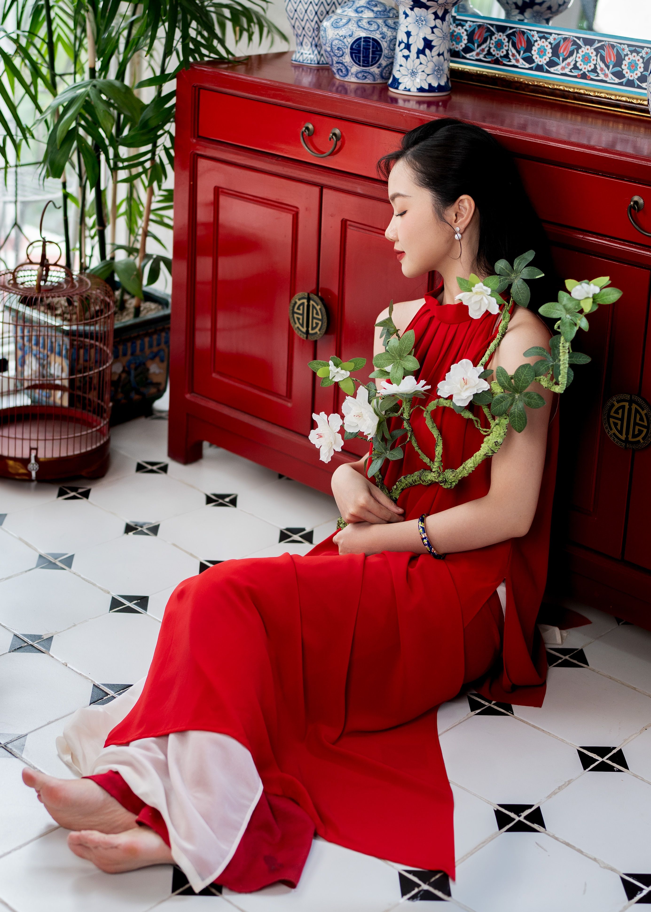 Elegant Woman in Red Dress Posing Indoors · Free Stock Photo