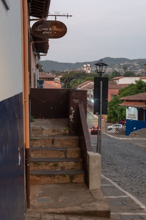 Free Charming view of Sabará, MG, Brazil with historic architecture and cobblestone street at twilight. Stock Photo