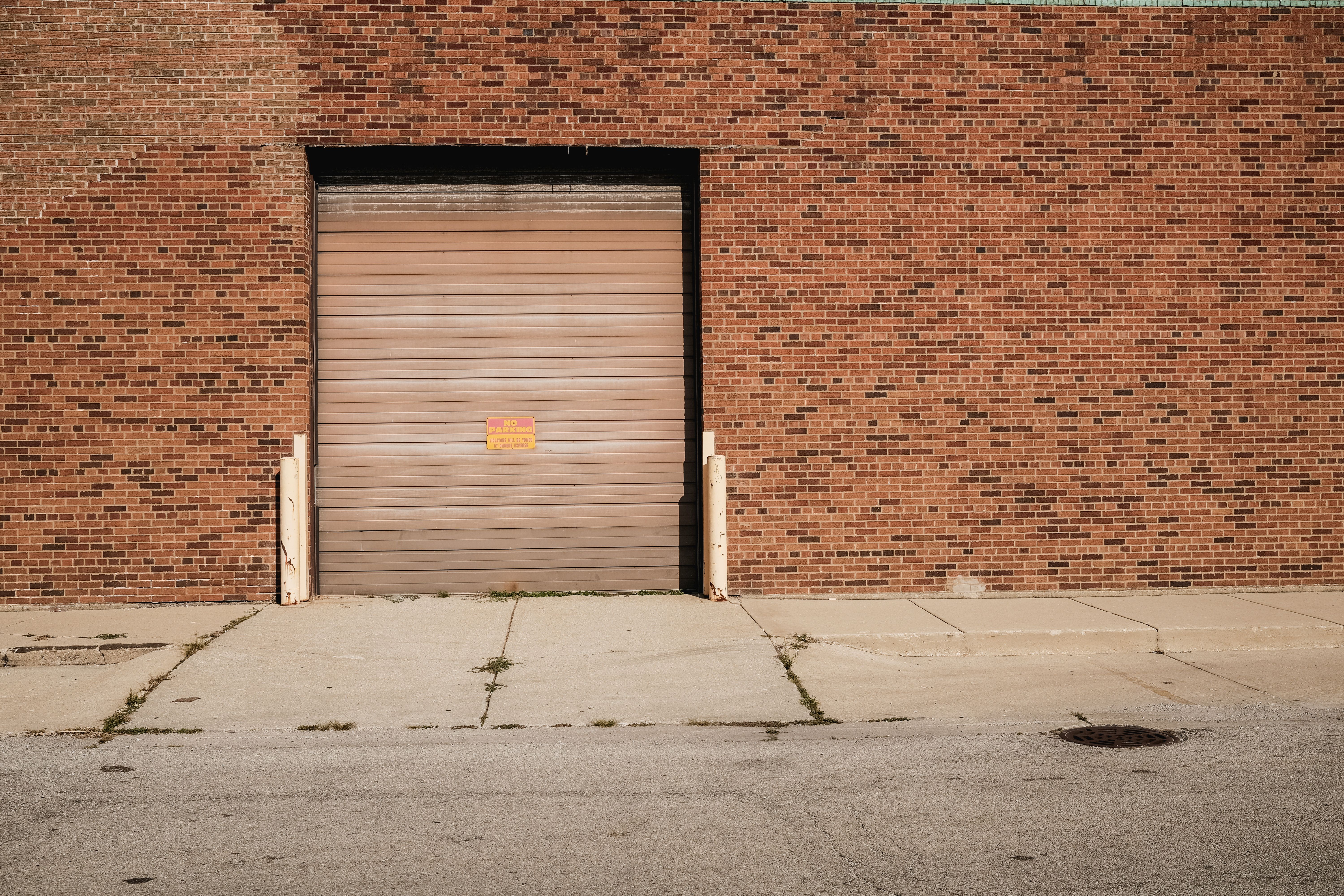 Bowing wall with visible cracks in a Chicago home illustrating common issues covered by insurance claims