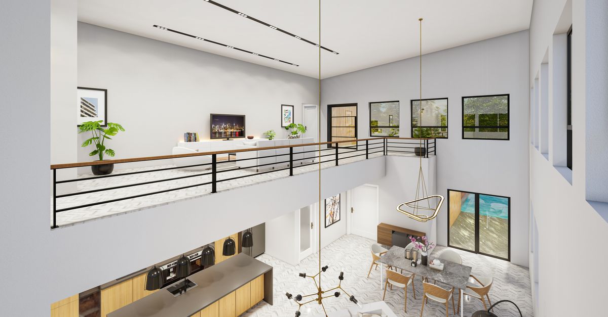 Spacious modern home interior with minimalist design and open balcony view.
