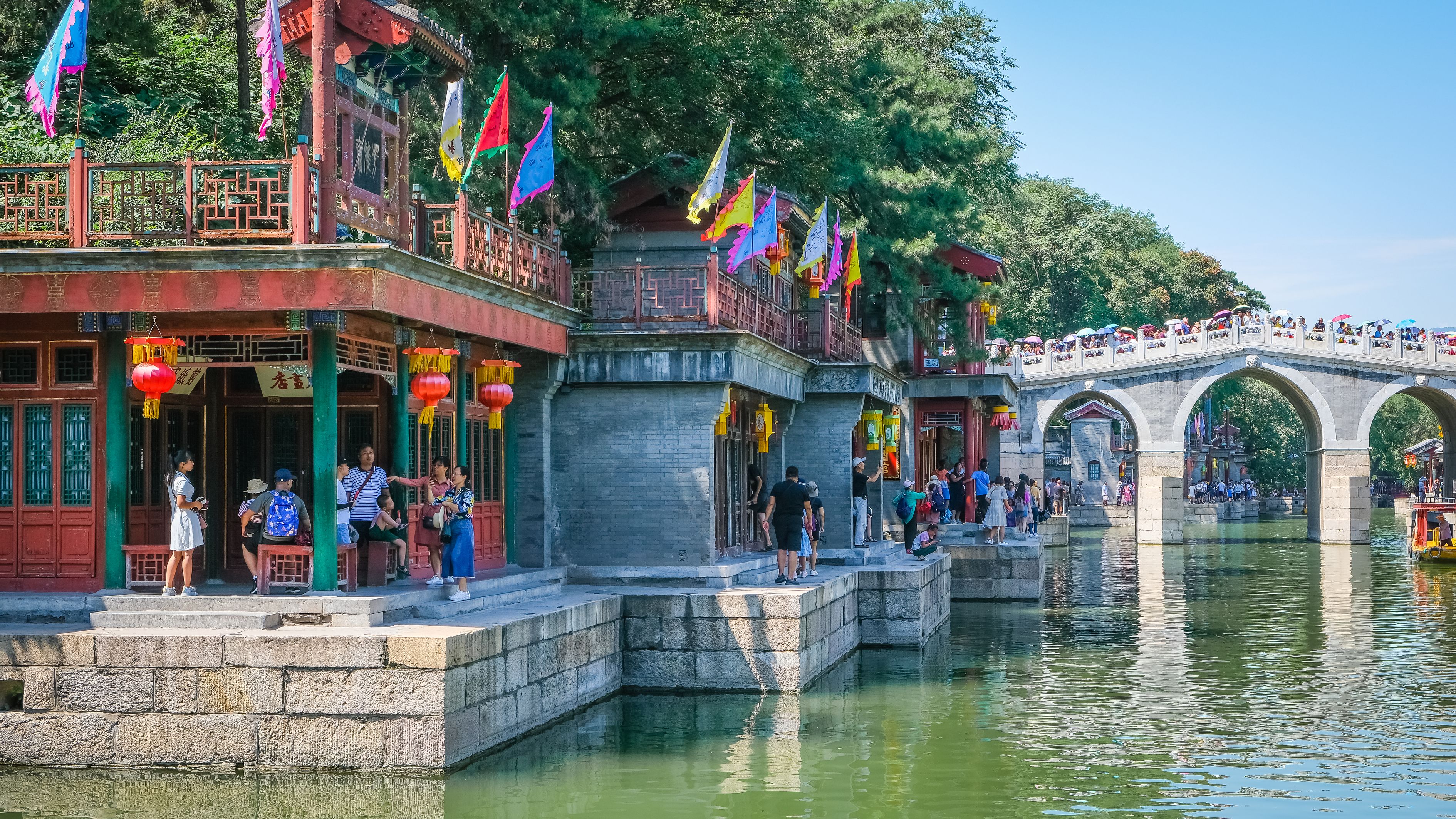 A Crowd Of People Visiting A Tourist Destination By The River Free a-crowd-of-people-visiting-a-tourist-destination-by-the-river-free