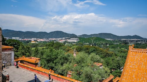 Free Temple Near Trees on Hill Stock Photo