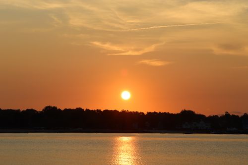 Free Captivating sunrise over Cove Island Park in Stamford, CT, reflecting golden hues. Stock Photo
