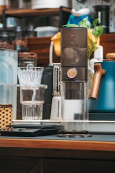 Stylish coffee brewing setup in a modern kitchen indicating a cozy atmosphere.