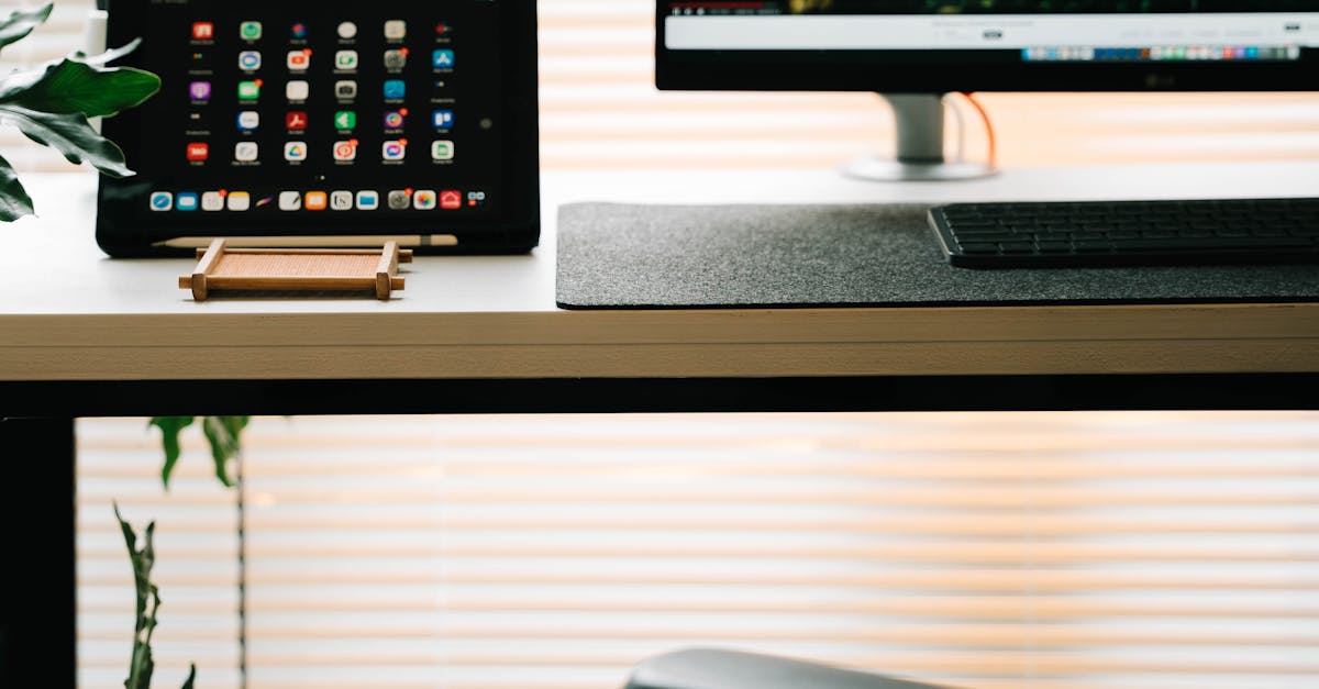 Photo by Alpha En A sleek office setup with tropical screensaver, perfect for productivity and relaxation.