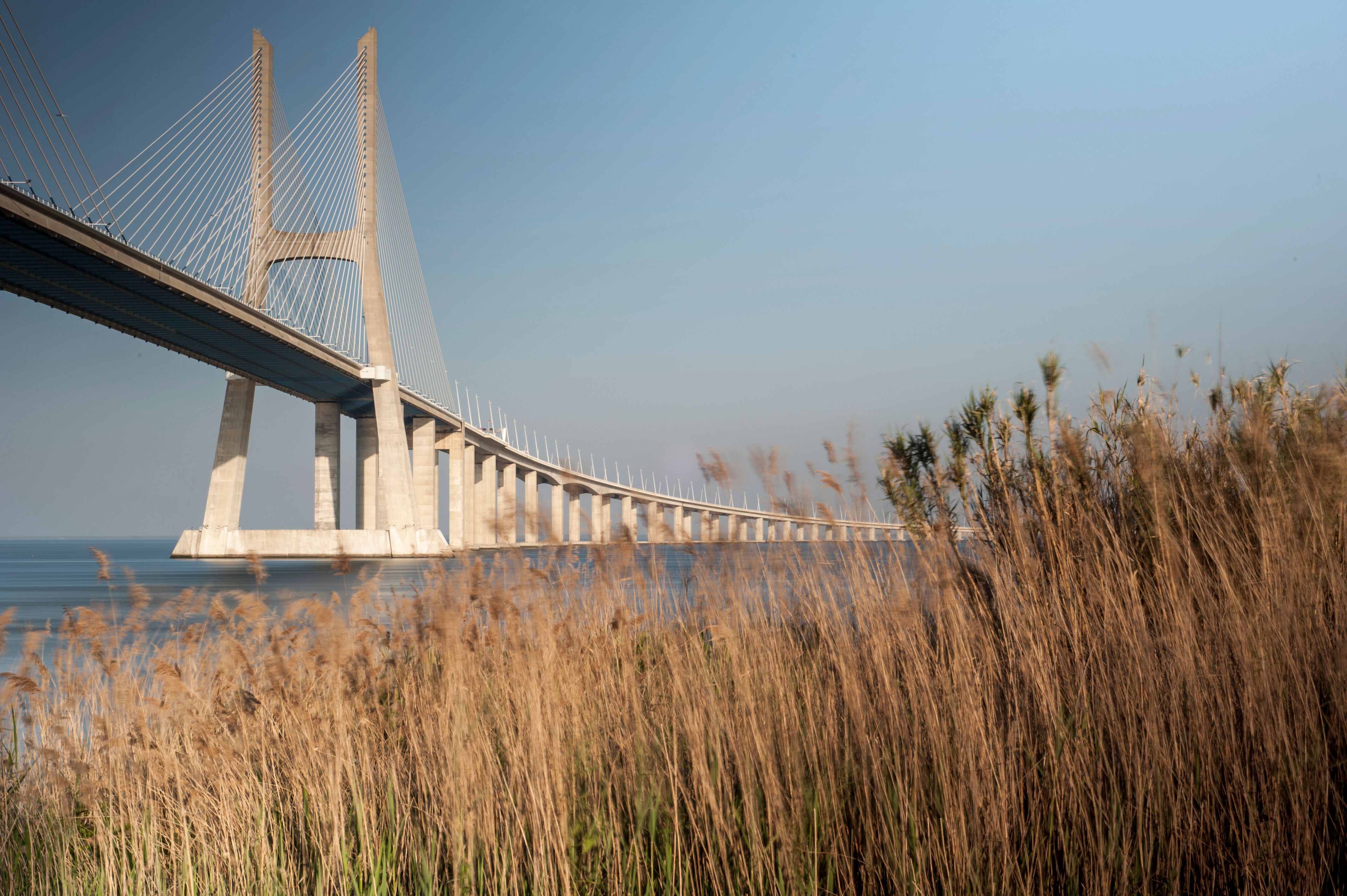 Stunning view of Vasco da Gama Bridge spanning the Tagus River in Lisbon, Portugal.