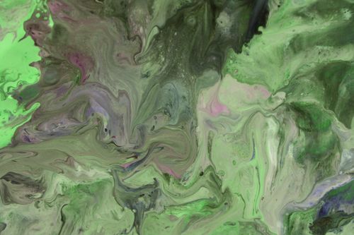 Free Vibrant abstract fluid art with green and purple swirls. Stock Photo