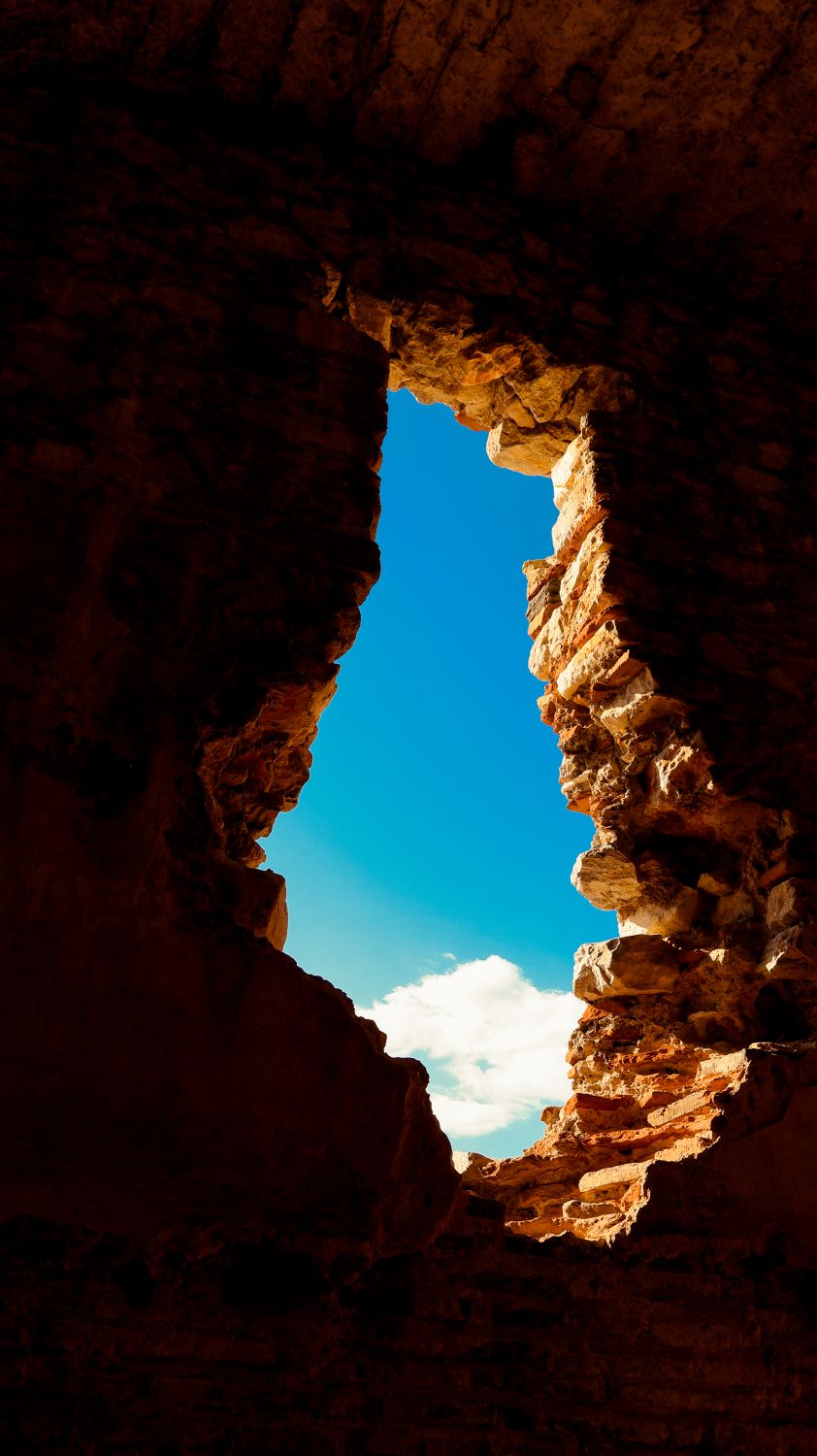 View of Blue Sky Through Ancient Stone Ruins · Free Stock Photo