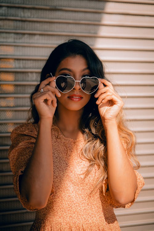 Woman Wearing A Heart-Shaped Sunglasses