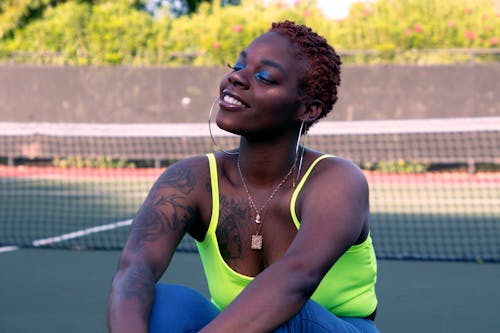 Monochrome Photo Of Woman Wearing Neon Tank Top