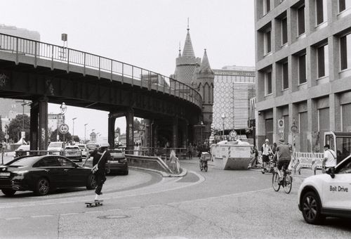 Free Black and white street scene near Berlin's Oberbaum Bridge, showcasing urban life. Stock Photo