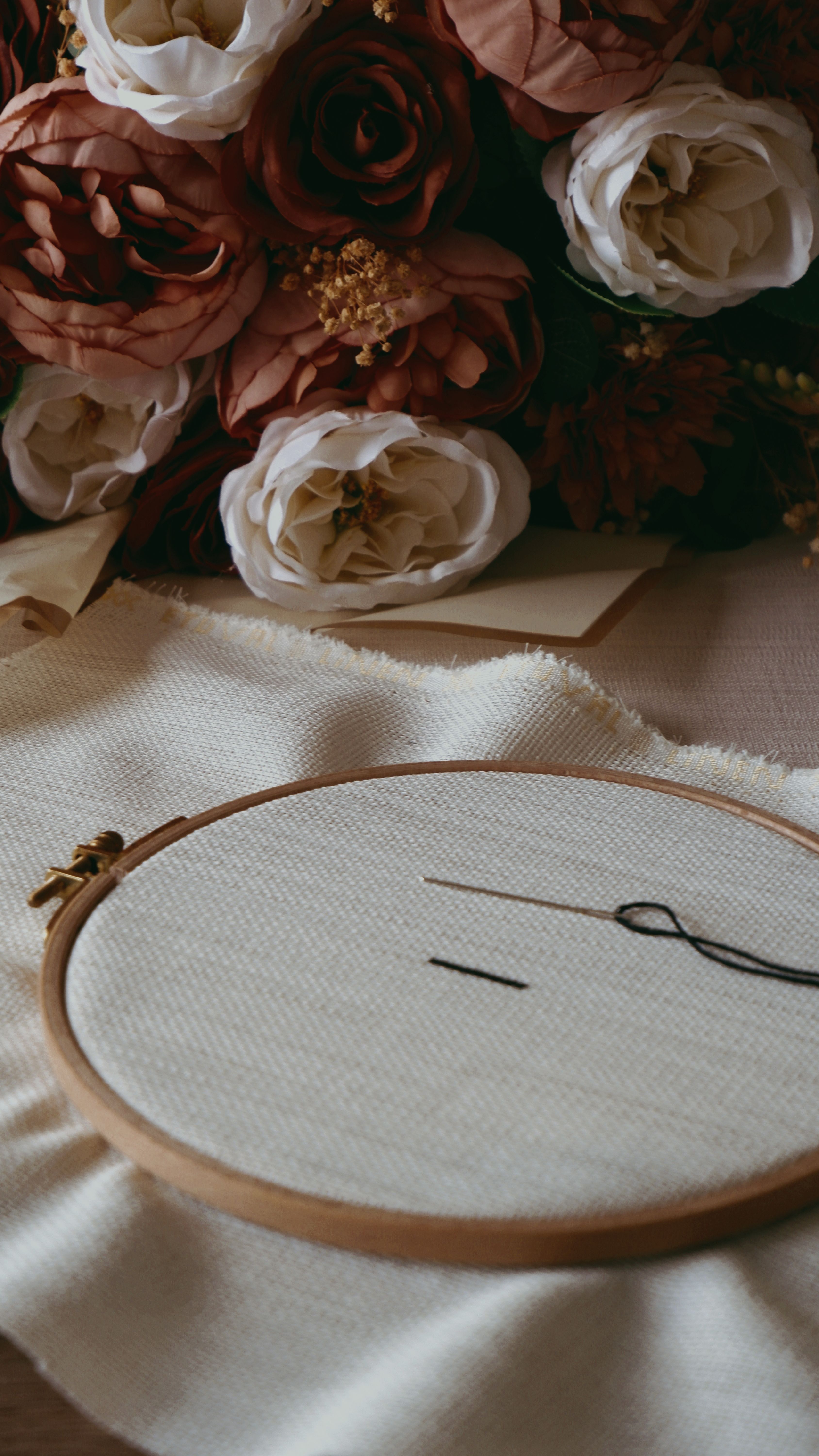 Elegant Embroidery Hoop with Floral Background · Free Stock Photo