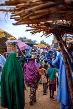 Busy market scene showcasing daily life in a vibrant African setting.