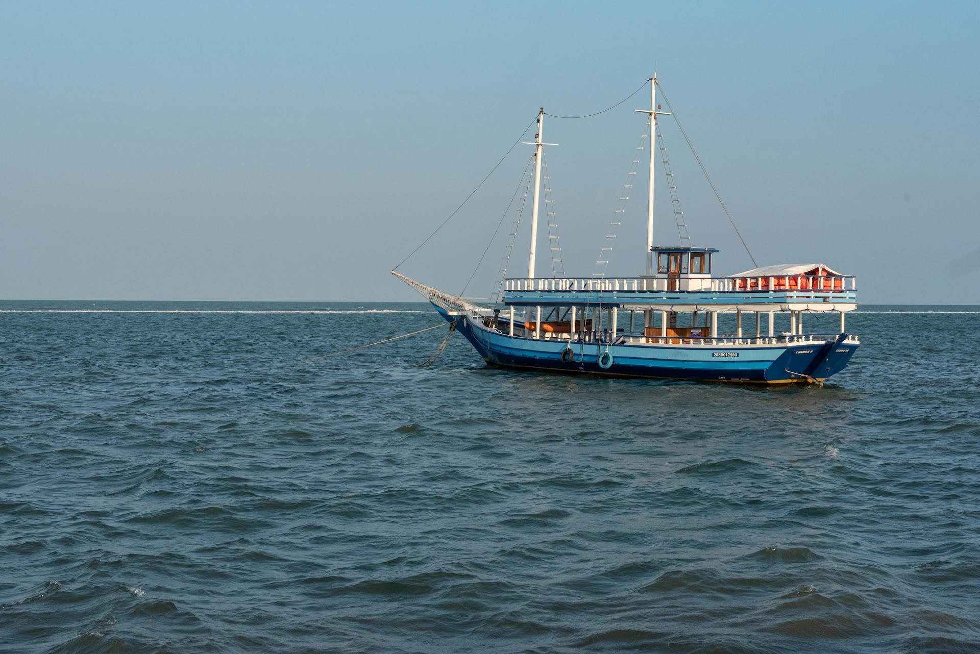 Serene Blue Boat on Waters of Porto Seguro